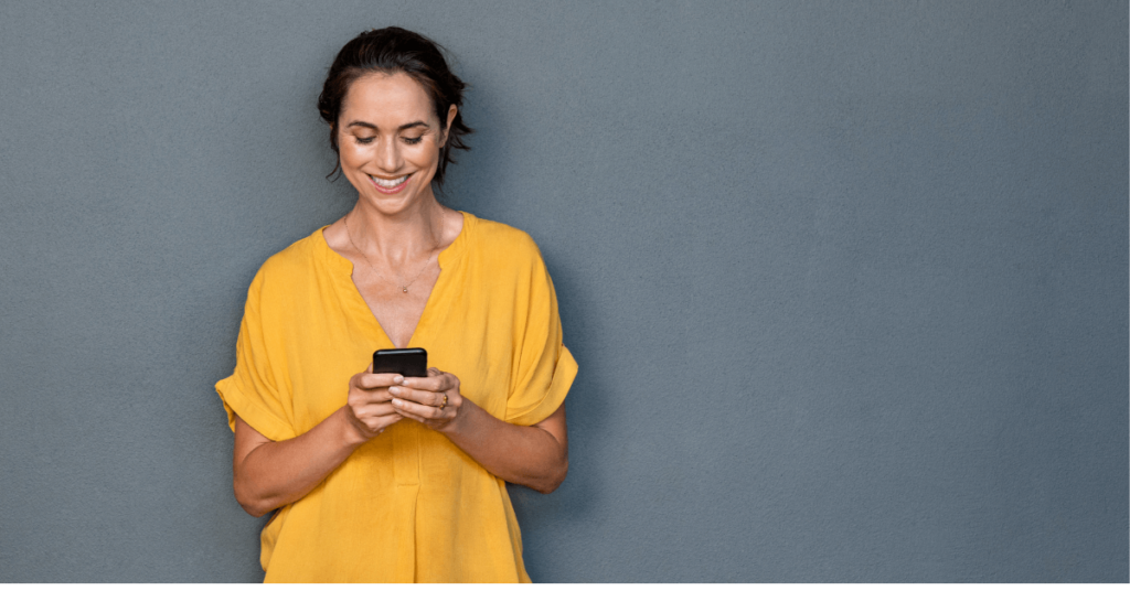 lady looking at mobile phone